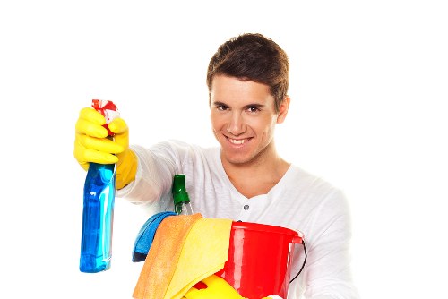 Vacuuming and sanitising a mattress during cleaning